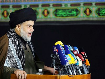 L'influent leader chiite Moqtada Sadr, chef de milices ayant combattu la présence américaine en Irak, s'exprime dans la ville sainte chiite de Najaf, au sud de Bagdad, le 7 décembre 2017 - Haidar HAMDANI [AFP/Archives]